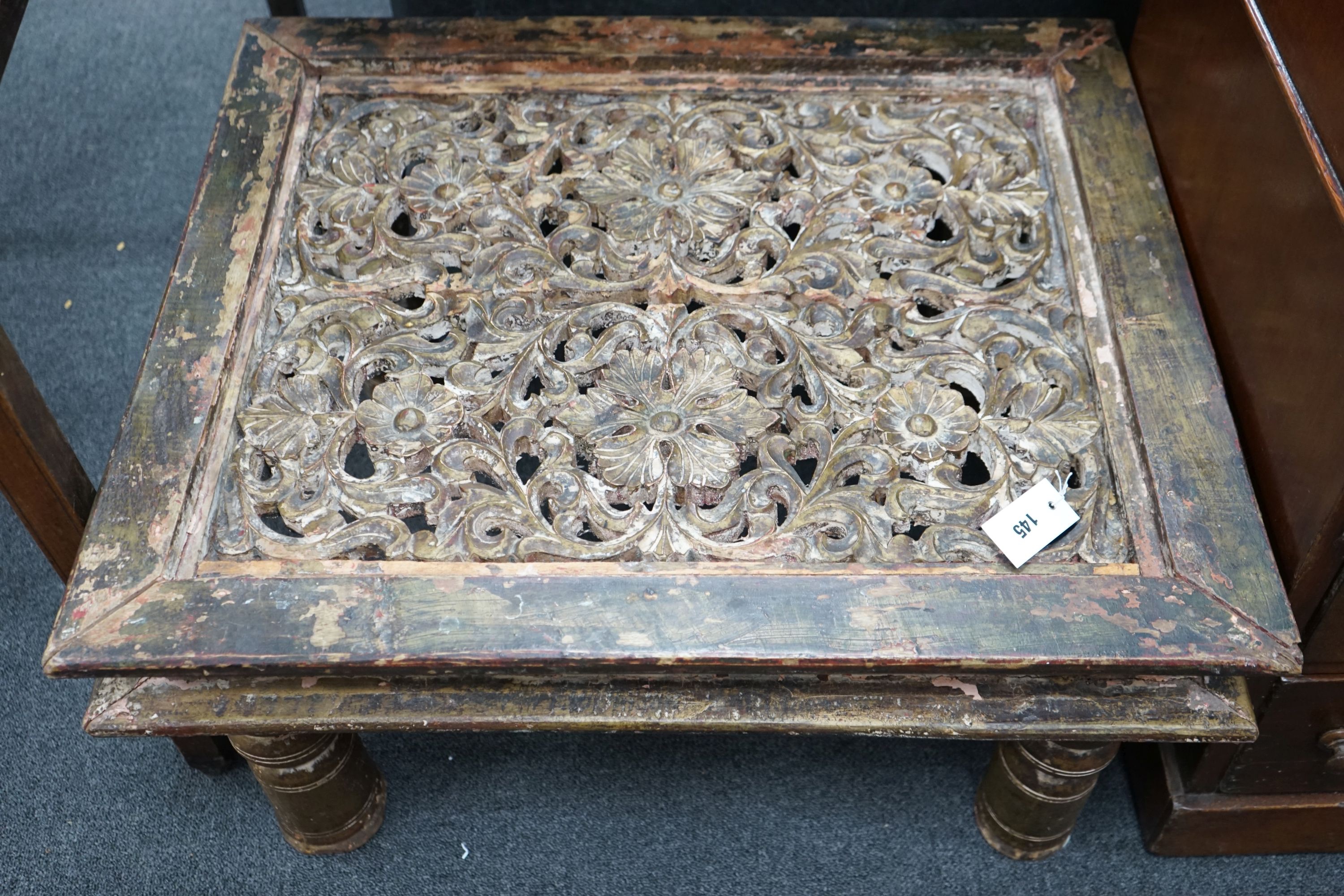An Indian part gilded and painted occasional table, width 65cm, depth 78cm, height 40cm